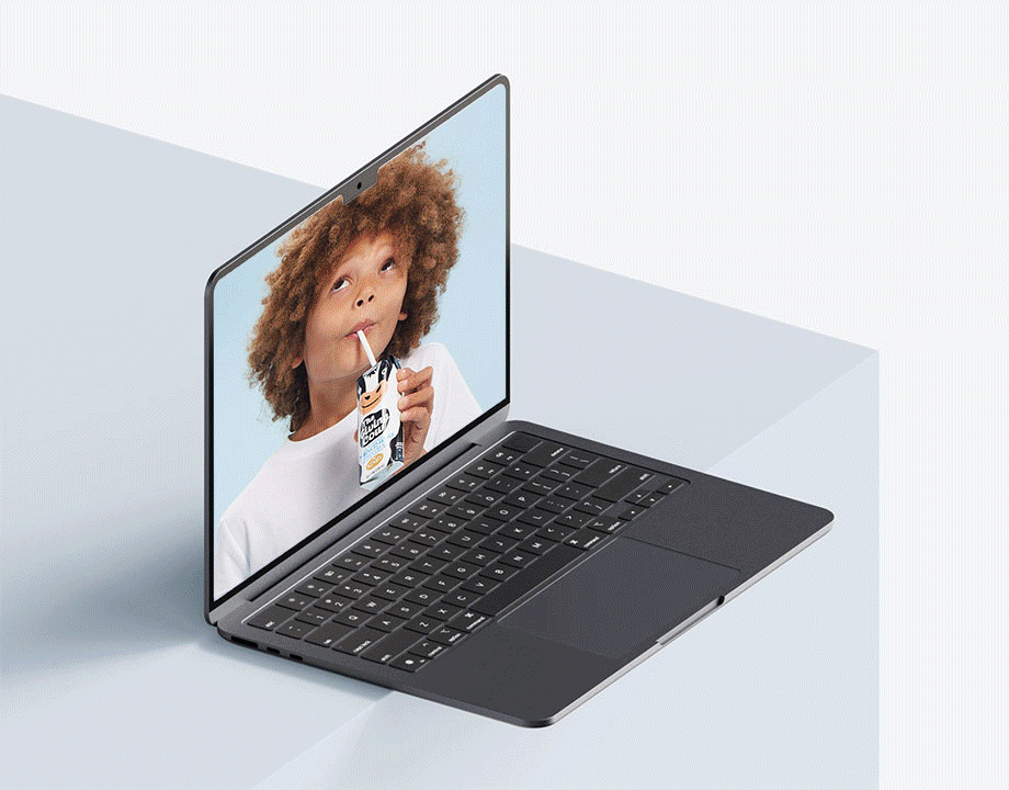 Laptop with open lid on light gray background